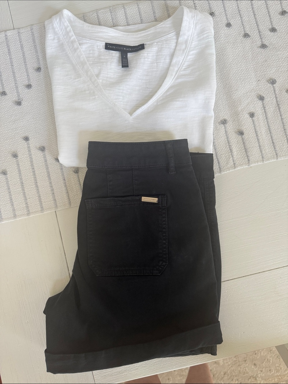 Black shorts w/ white top